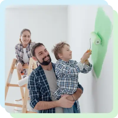 a family of three where the kid is painting his home